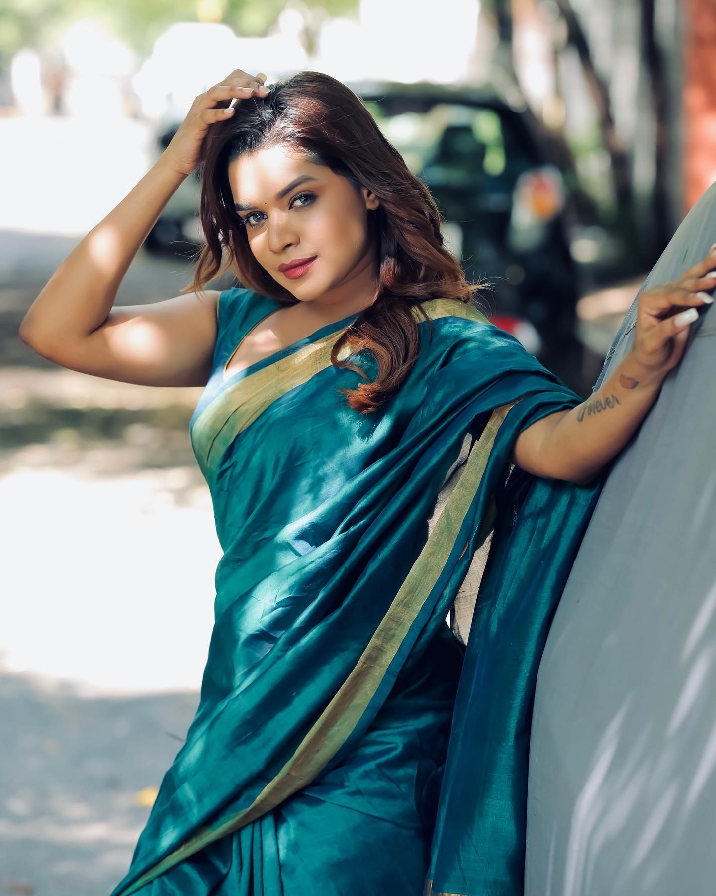 Veena Jessi alluring in green saree
